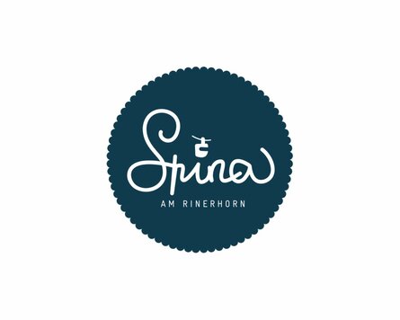 Blue logo of the Spina restaurant at the Rinerhorn. | © Davos Klosters Mountains
