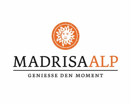The Madrisa-Alp logo is adorned by a sun. | © Davos Klosters Mountains